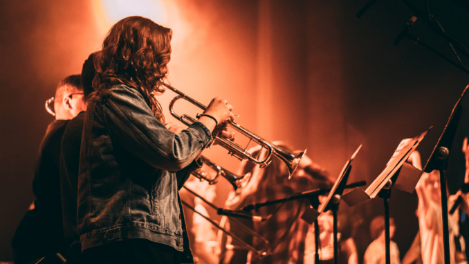 Canva - Person Performing Trumpet