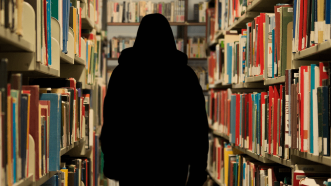 Canva - Person in a Bookstore