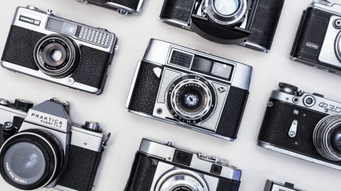 Canva - Nine Gray-and-black Land Cameras